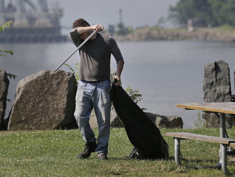 Robert Gidney wipes away sweat while working in Palisades Interstate Park in Ft. Lee, N.J., Monday, July 2, 2018. (Seth Wenig/AP Photo)