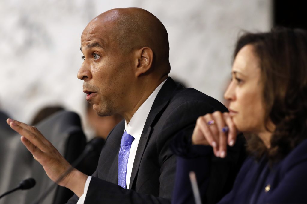Cory Booker, Kamala Harris Sen. Cory Booker, D-N.J., (left), next to Sen. Kamala Harris, D-Calif., questions President Donald Trump's Supreme Court nominee, Brett Kavanaugh, as he testifies before the Senate Judiciary Committee on Capitol Hill in Washington, Wednesday, Sept. 5, 2018, on the second day of his confirmation hearing to replace retired Justice Anthony Kennedy. (Jacquelyn Martin/AP Photo)