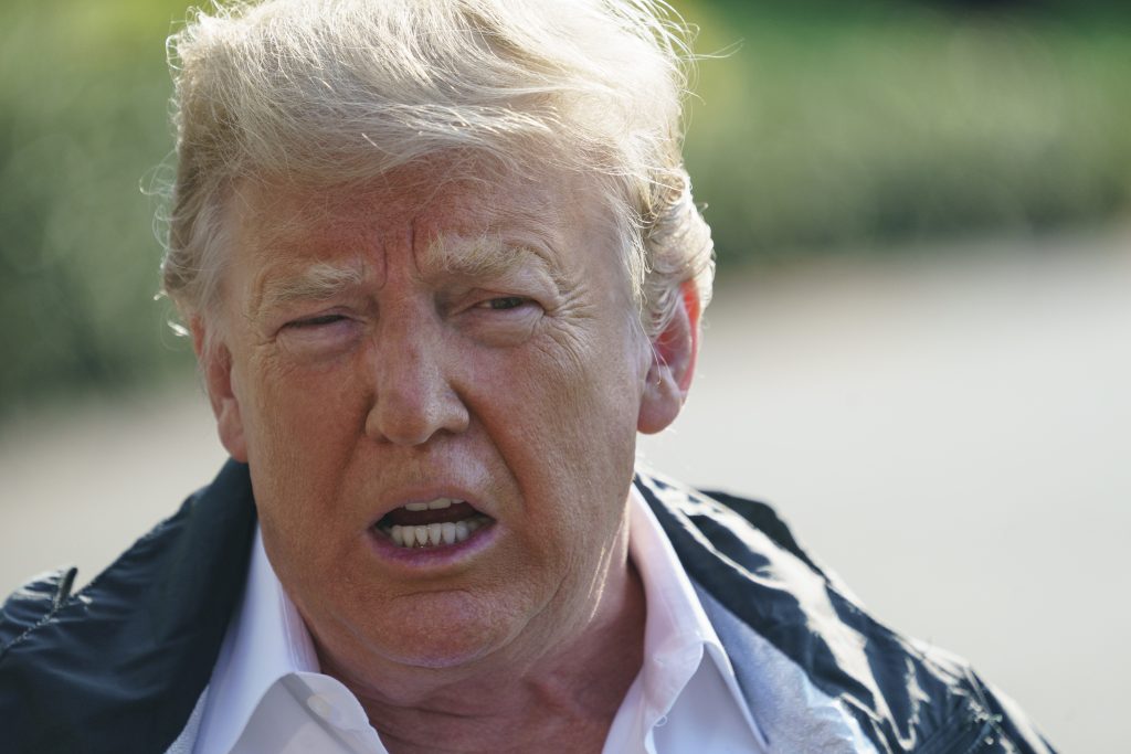 Donald Trump President Donald Trump talks to media before boarding Marine One on the South Lawn of the White House in Washington, Wednesday, Sept. 19, 2018, for the short trip to Andrews Air Force Base en route to Havelock, N.C. (AP Photo/Carolyn Kaster)