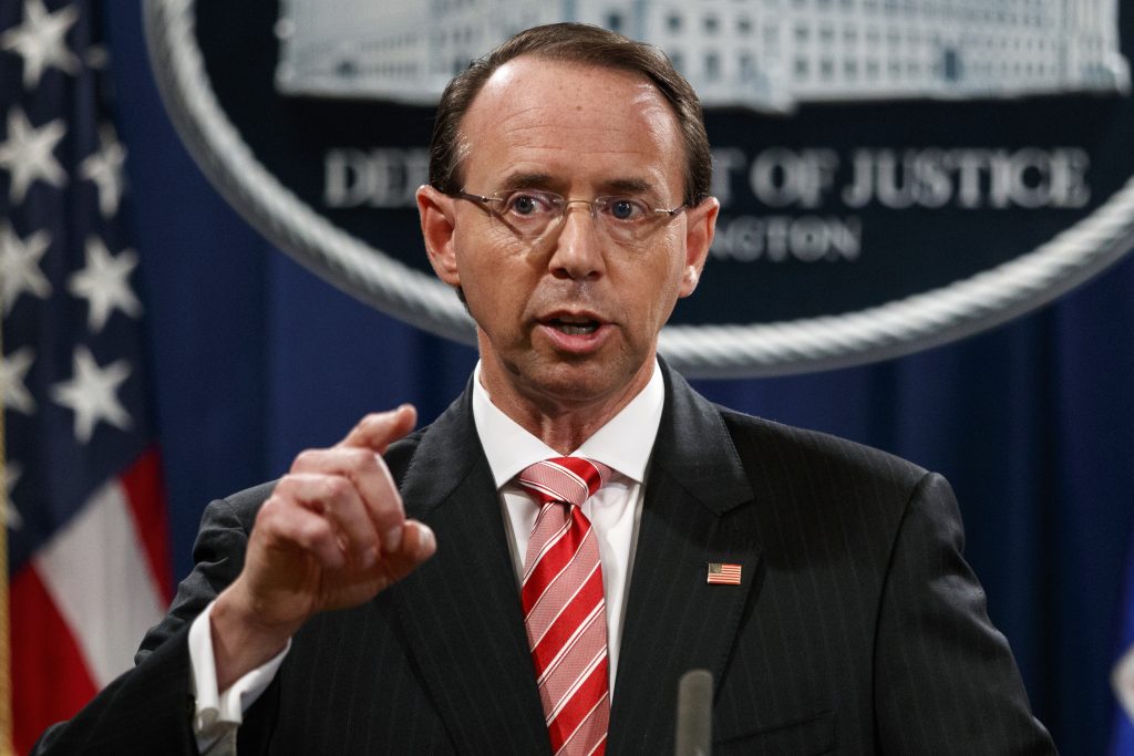 Rod Rosenstein In this July 13, 2018, file photo, Deputy Attorney General Rod Rosenstein speaks during a news conference at the Department of Justice in Washington. Rosenstein is denying a report in The New York Times that he suggested last year that he secretly record President Donald Trump in the White House to expose the chaos in the administration. Rosenstein says the story is “inaccurate and factually incorrect.” (Evan Vucci/AP Photo, File)