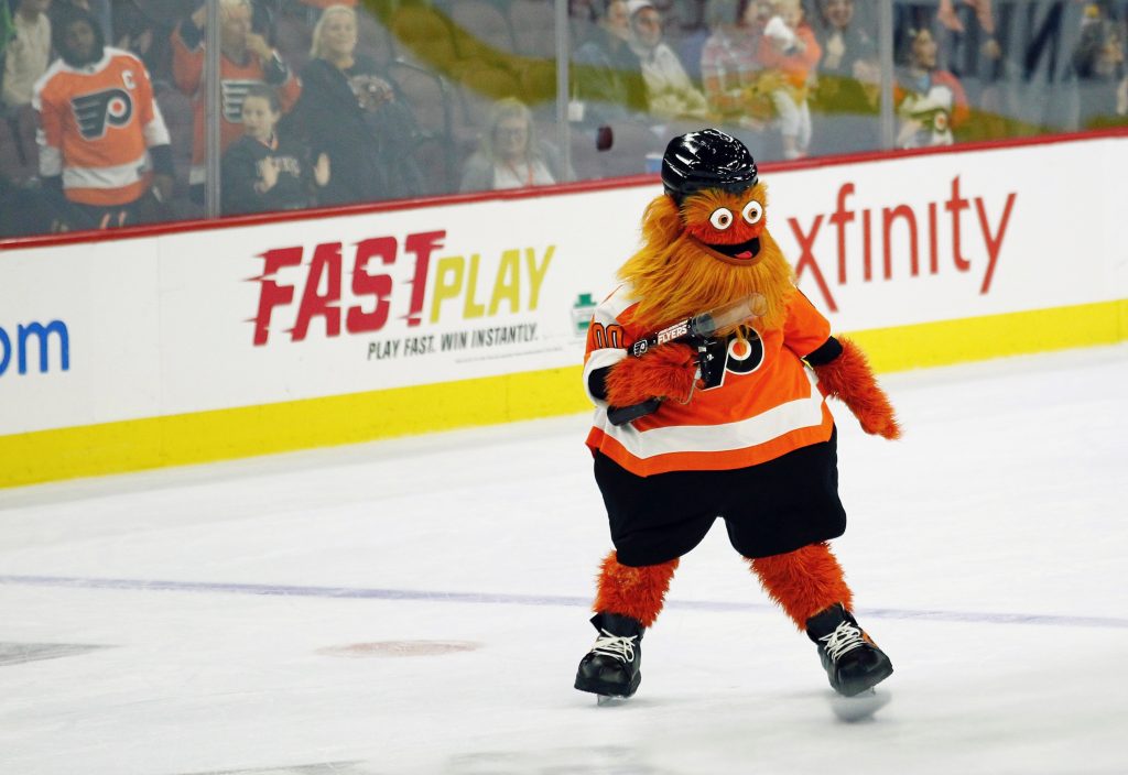 Gritty Gritty skates on the ice