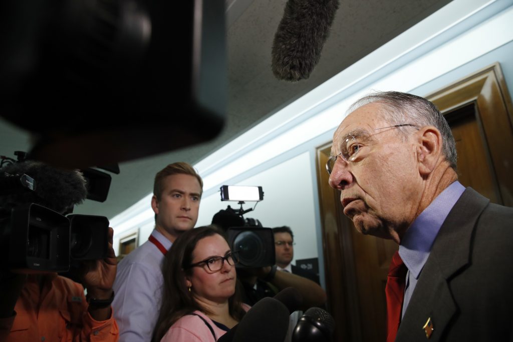 Chuck Grassley Sen. Chuck Grassley, R-Iowa, right, chair of the Senate Judiciary Committee, answers questions from reporters about allegations of sexual misconduct against Supreme Court nominee Brett Kavanaugh, Wednesday, Sept. 26, 2018, as he arrives for a Senate Finance Committee hearing on Capitol Hill in Washington. (AP Photo/Jacquelyn Martin)