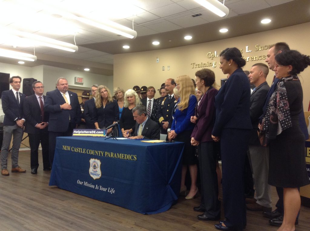 IMG_0681 Gov. John Carney signed three bills aimed at addressing Delaware's opioid crisis. (Zoe Read/WHYY)