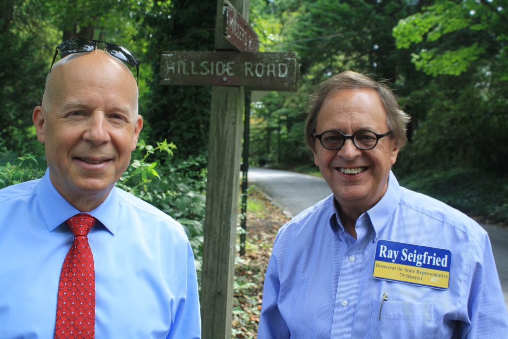 Braunstein seigried arden House race Republican Eric Braunstein and Ray Seigfried live a few doors from each other in Arden, but are opponents in the race for the 7th District seat in the Delaware House of Representatives. (Cris Barrish/WHYY)