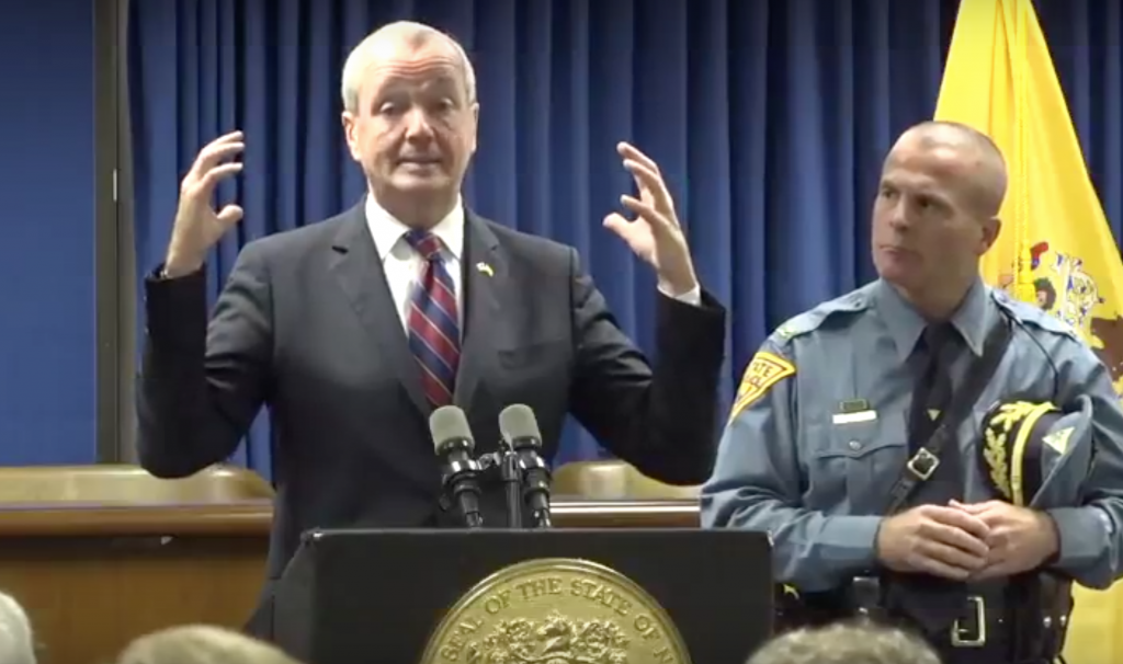Screen Shot 2018-09-11 at 2.50.12 PM New Jersey Governor Phil Murphy, flanked by New Jersey State Police Superintendent Col. Patrick J. Callahan, speaks about storm preparations at a Tuesday afternoon press conference in Newark. (Screencap/Governor's Office)