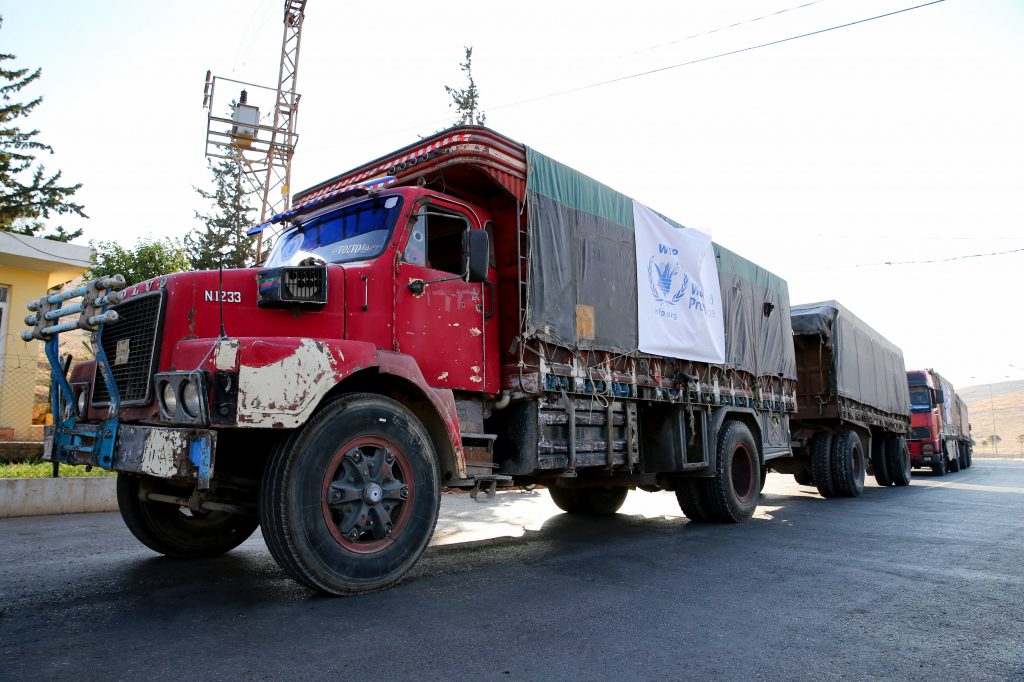 A World Food Programme convoy carries humanitarian aid to Aleppo, Syria. Getting food into conflict zones is a major hurdle — and a topic of discussion at the WFP’s Innovation Accelerator. A World Food Programme convoy carries humanitarian aid to Aleppo, Syria. Getting food into conflict zones is a major hurdle — and a topic of discussion at the WFP's Innovation Accelerator. (Cem Genco/Anadolu Agency/Getty Images)