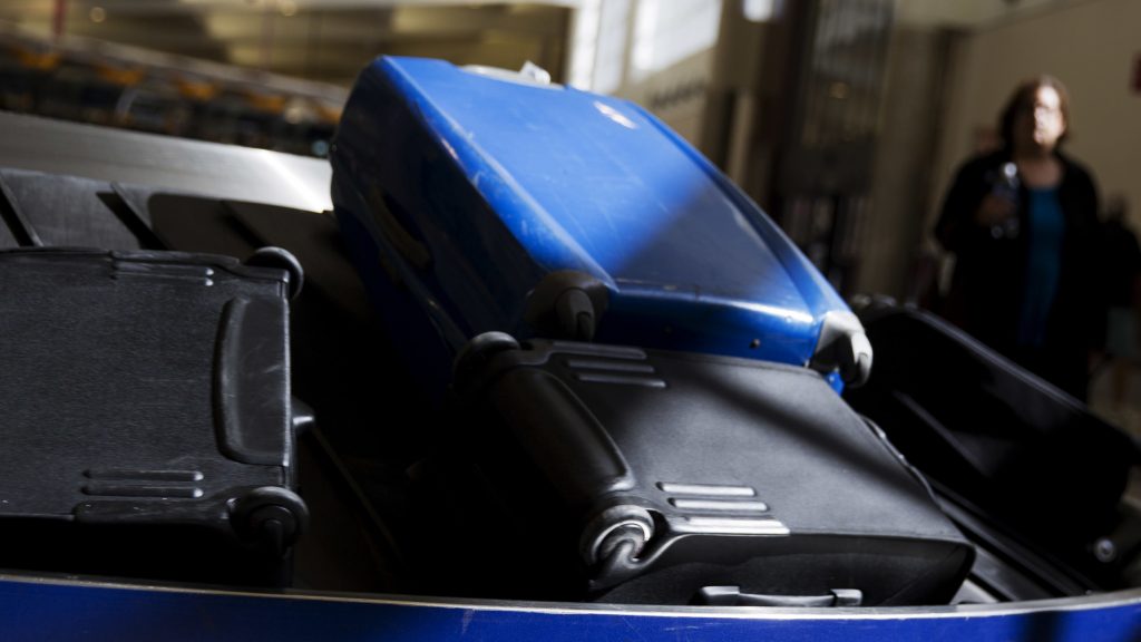 Checking baggage will get more expensive with four airlines announcing fee increases this month. Checking baggage will get more expensive with four airlines announcing fee increases this month. (David Goldman/AP)