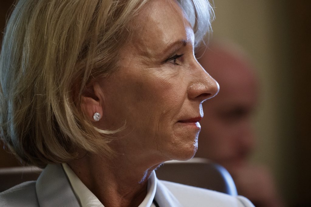 Secretary of Education Betsy DeVos listens as President Donald Trump speaks during a June 21 cabinet meeting at the White House in Washington. Secretary of Education Betsy DeVos listens as President Donald Trump speaks during a June 21 cabinet meeting at the White House in Washington.
(Evan Vucci/AP)