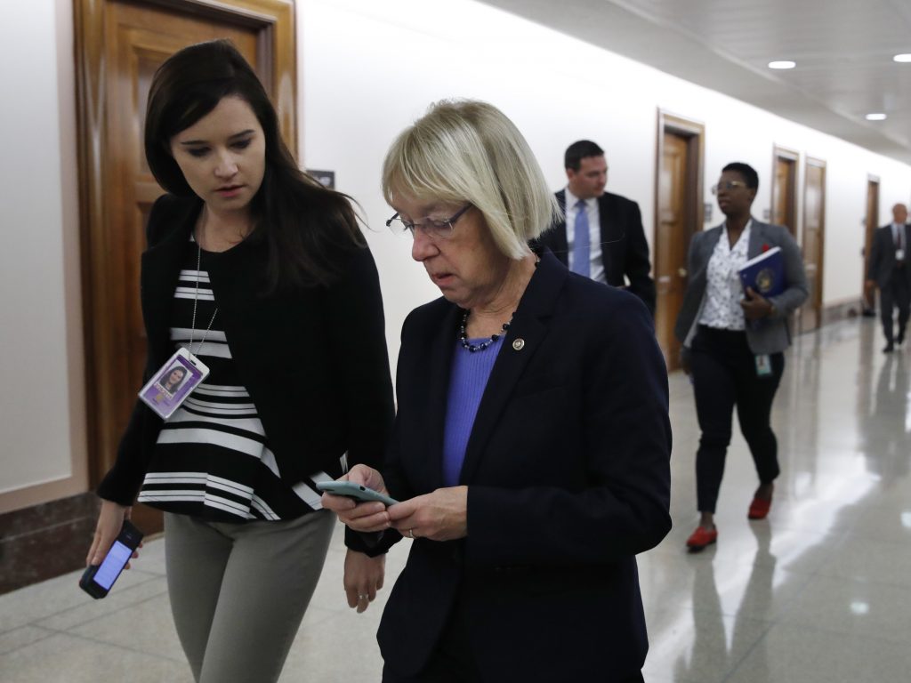 Sen. Patty Murray, D-Wash., works on her cellphone on Capitol Hill. In a recent letter, Sen. Ron Wyden said some senators and Senate staff members were warned that their personal email accounts were targeted by foreign government hackers. Sen. Patty Murray, D-Wash., works on her cellphone on Capitol Hill. In a recent letter, Sen. Ron Wyden said some senators and Senate staff members were warned that their personal email accounts were targeted by foreign government hackers. (Jacquelyn Martin/AP)