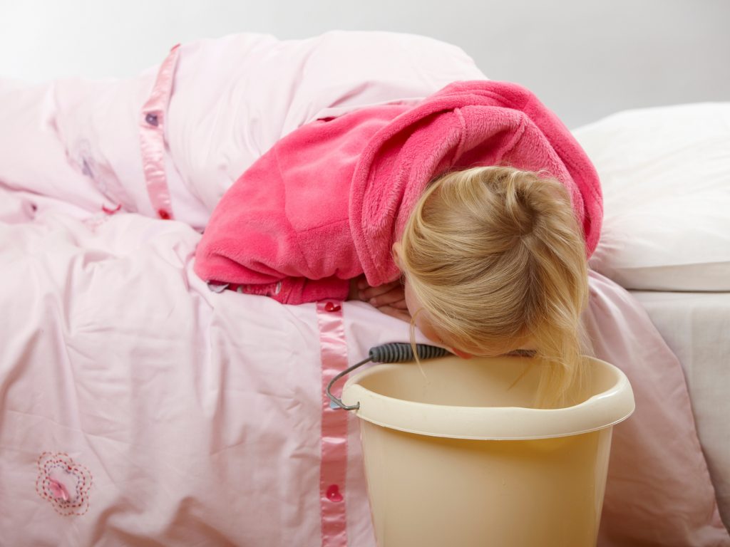 Children’s vomiting reaction is easily triggered and sometimes all parents can do is hold back their hair and wait it out. Children's vomiting reaction is easily triggered and sometimes all parents can do is hold back their hair and wait it out.
(Image Source/Getty Images/Image Source)