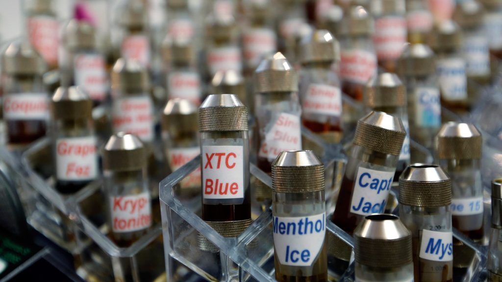 ecig16x9 Vials of flavored liquid at a store selling electronic cigarettes and related items in Los Angeles. (AP Photo/Reed Saxon, File)