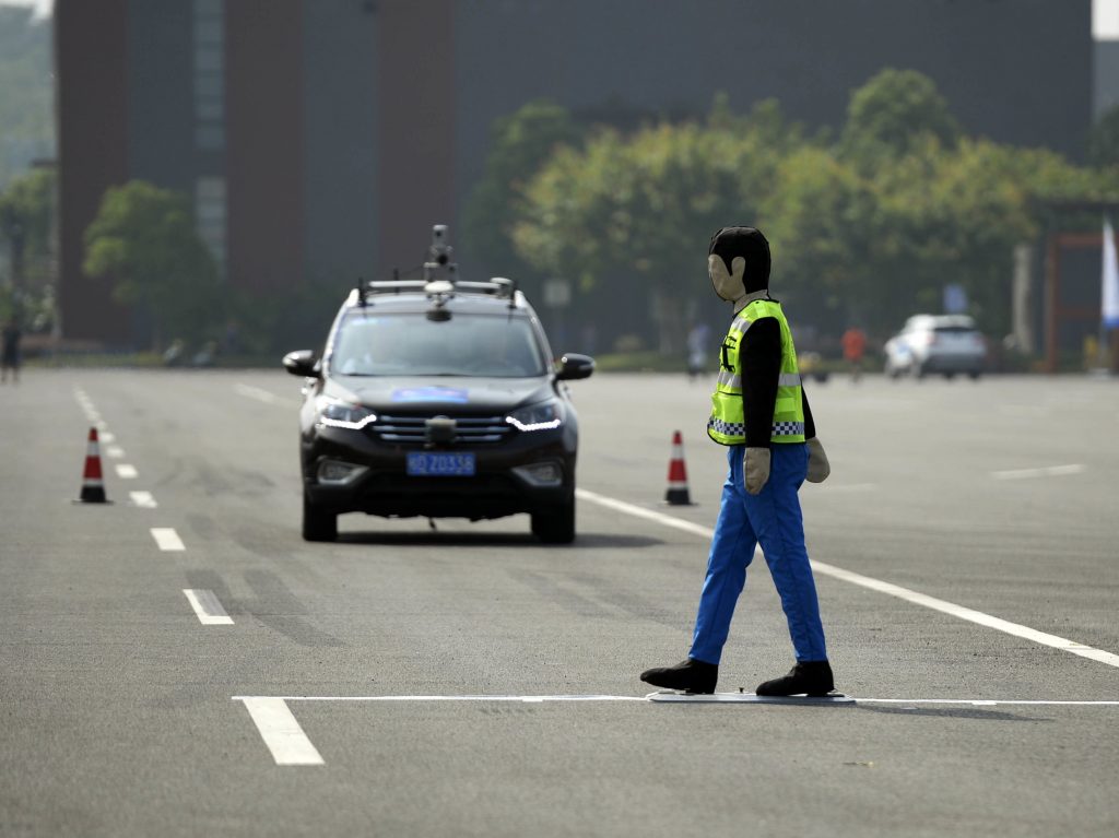 An unmanned automobile competes in the i-VISTA (Intelligent Vehicle Integrated Systems Test Area) Autonomous Driving Challenge on August 18 in Chongqing, China. An unmanned automobile competes in the i-VISTA (Intelligent Vehicle Integrated Systems Test Area) Autonomous Driving Challenge on August 18 in Chongqing, China. (VCG/Getty)