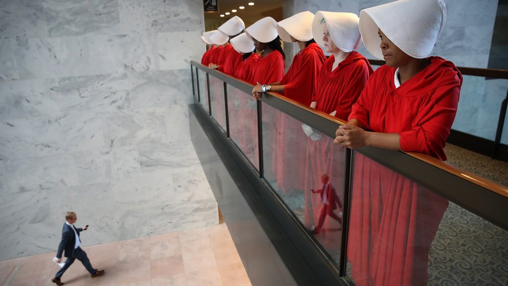 Protesters dressed as characters from The Handmaid's Tale outside the confirmation hearing for Brett Kavanaugh on Tuesday.