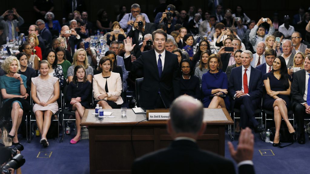 Supreme Court nominee Judge Brett Kavanaugh is sworn in by committee Chairman Chuck Grassley, R-Iowa, to testify during his confirmation hearing on Capitol Hill Tuesday in Washington, D.C.