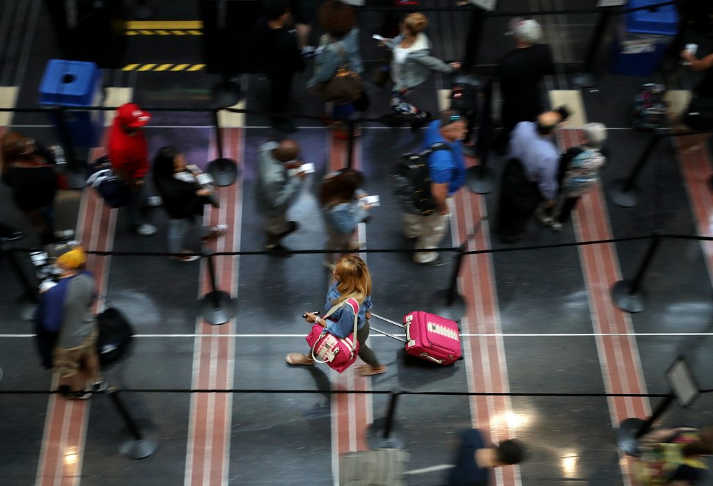 Viruses thrive in the security lines at airports, according to several studies. Viruses thrive in the security lines at airports, according to several studies. (Chip Somodevilla/Getty Images)