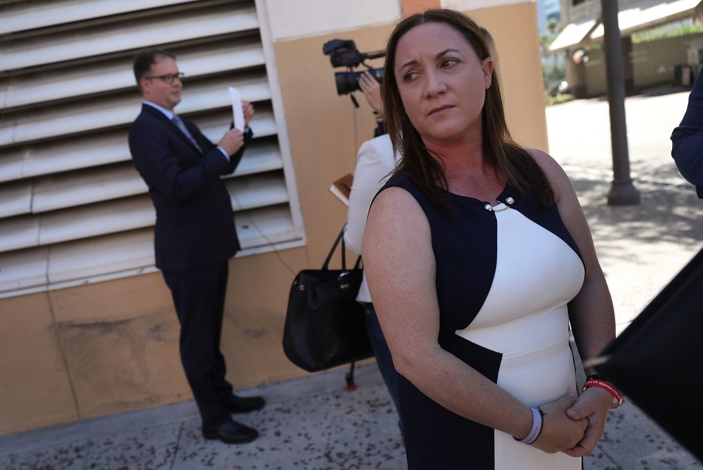 Lori Alhadeff and Ryan Petty, left, are seen in Fort Lauderdale, Fla., after turning in their paperwork to run for the Broward County School Board in May. Both parents had a 14-year-old daughter who was killed in the mass shooting at Marjory Stoneman Douglas High School in February. Lori Alhadeff and Ryan Petty, left, are seen in Fort Lauderdale, Fla., after turning in their paperwork to run for the Broward County School Board in May. Both parents had a 14-year-old daughter who was killed in the mass shooting at Marjory Stoneman Douglas High School in February. (Joe Raedle/Getty Images)
