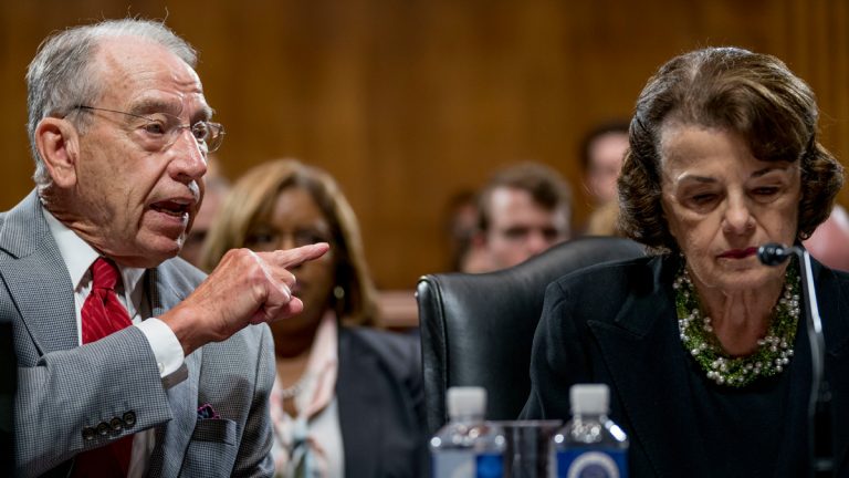 Senate Judiciary Committee Chairman Chuck Grassley, R-Iowa, left, accompanied by Sen. Dianne Feinstein, D-Calif., the ranking member, right, speaks during a Senate Judiciary Committee markup meeting on Capitol Hill, Thursday, Sept. 13, 2018, in Washington. The committee will vote next week on whether to recommend President Donald Trump's Supreme Court nominee, Brett Kavanaugh for confirmation. Republicans hope to confirm him to the court by Oct. 1.(AP Photo/Andrew Harnik)