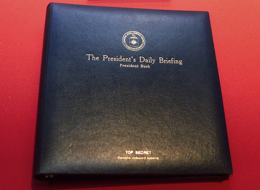 The President's Daily Briefing, or PDB, is the top-secret intelligence report the CIA presents to the president every weekday. The book shown here is for a briefing delivered to President George W. Bush in 2002.
(Damian Dovarganes/AP)
