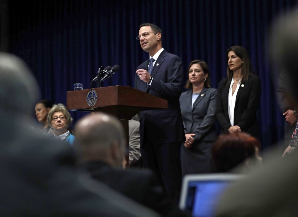 Josh Shapiro Pennsylvania Attorney General Josh Shapiro speaks during a news conference at the Pennsylvania Capitol in Harrisburg, Pa., Tuesday, Aug. 14, 2018. A Pennsylvania grand jury says its investigation of clergy sexual abuse identified more than 1,000 child victims. The grand jury report released Tuesday says that number comes from records in six Roman Catholic dioceses. (AP Photo/Matt Rourke)