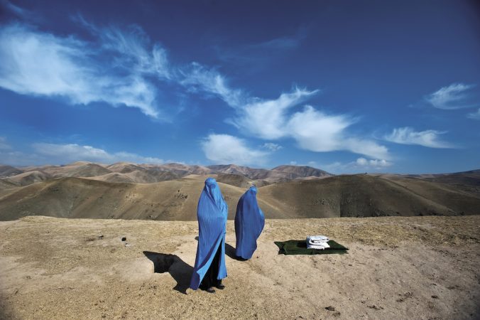 Noor Nisa, eighteen (right), in labor and stranded with her mother in Badakhshan Province, Afghanistan, November 2009.Her husband’s first wife died during childbirth, so he was determined to get her to the hospital, a four-hour drive from theirvillage. His borrowed car broke down and I ended up taking them to the hospital, where Noor Nisa delivered a baby girl.
