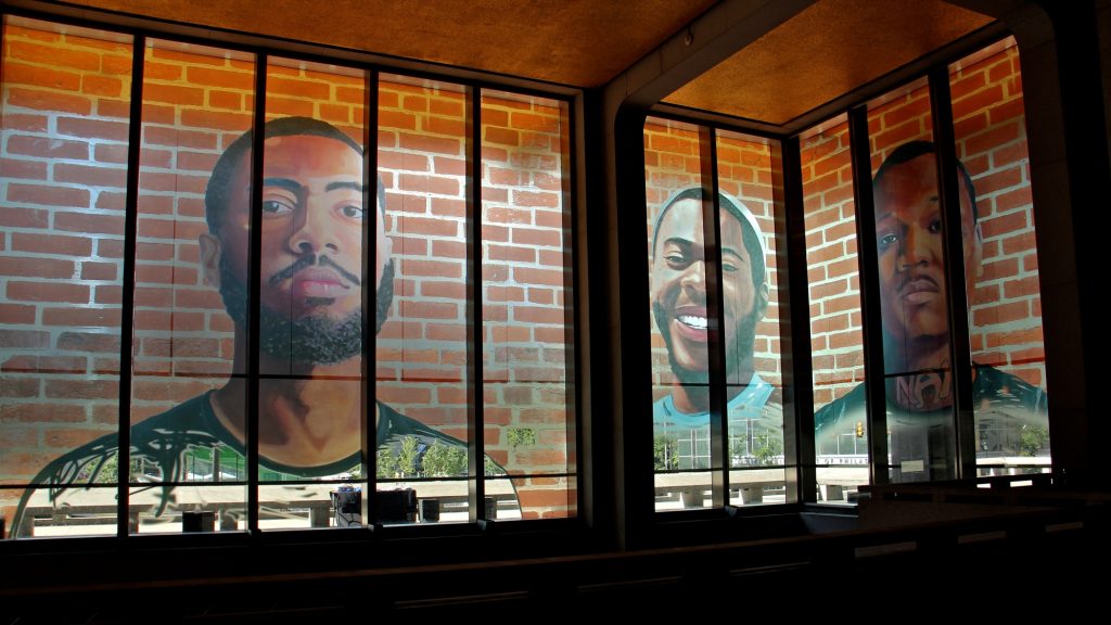2018 10 03-e lee-philadelphia municipal services building mural arts portraits of justice The first floor of the Municipal Services Building is wrapped with the portraits of 17 formerly incarcerated young men and women as part of the Mural Arts