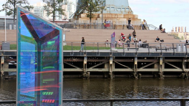 The Cherry Street Pier's artwork is echoed on the neighboring Race Street Pier. (Emma Lee/WHYY)