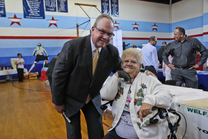Pennsylvania state Rep.  John Taylor organized a Friday event to get information on Medicare options out to seniors. Rose Marie Webster, a Medicare recipient, attended the expo. (Kimberly Paynter/WHYY)