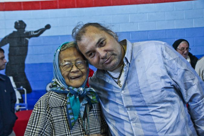 Ruth Young, 92, and her son David Matic attend the senior expo in Port Richmond. (Kimberly Paynter/WHYY)