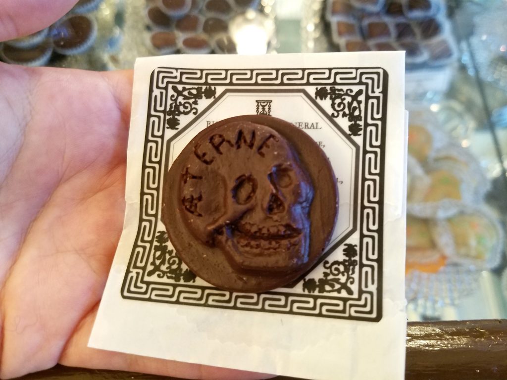2018 10 19-p crimmins-philadelphia crane confectionery-victorian funeral biscuit A traditional Victorian funeral biscuit, recreated as a chocolate medallion, is for sale at Shane Confectionery in Old City. (Peter Crimmins/WHYY)