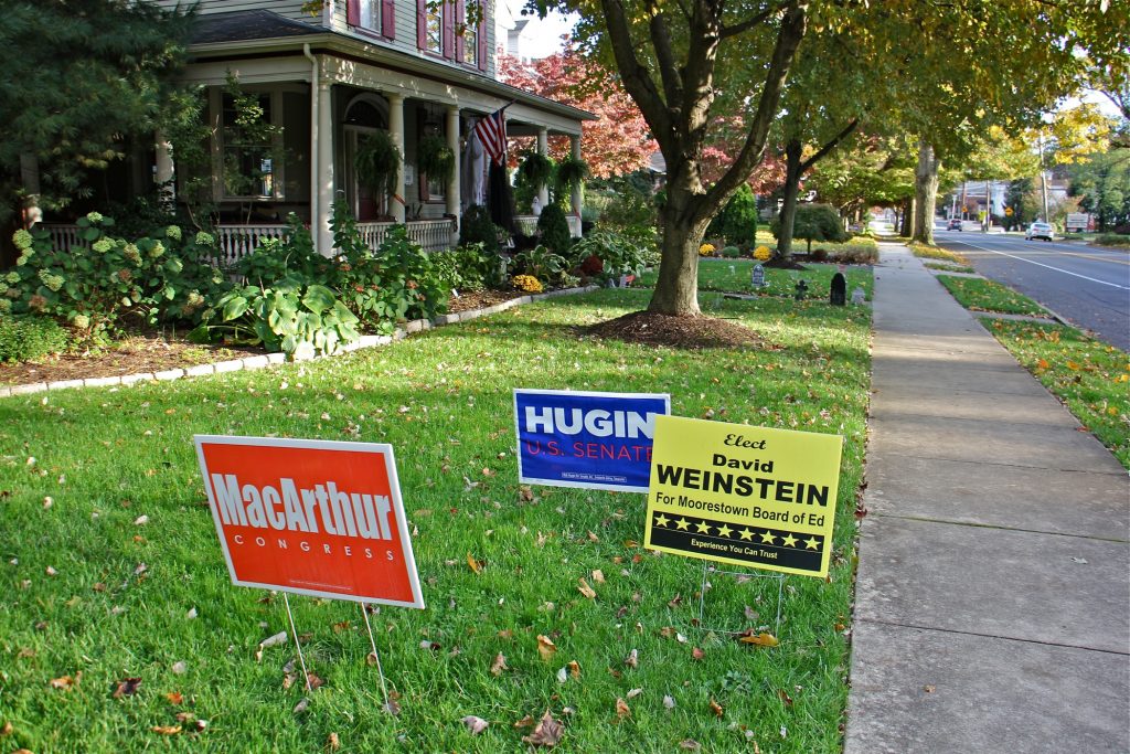 2018 10 29-e lee-moorestown-election Yard signs on Second Street in Moorestown, New Jersey, support the Republican slate, topped by Bob Hugin for Senate and Tom MacArthur for Congress.