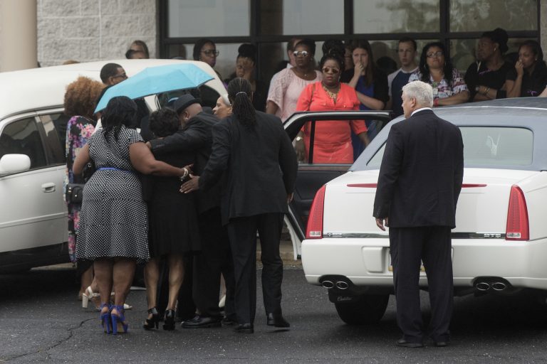People gather for 18-year-old Bianca Roberson's viewing and funeral at St. Paul's Baptist Church in West Chester, Pa., Friday, July 7, 2017. A man driving down a Pennsylvania highway shot the recent high school graduate in the head, killing her, as the two tried to merge into a single lane, authorities said. (Matt Rourke/AP Photo)