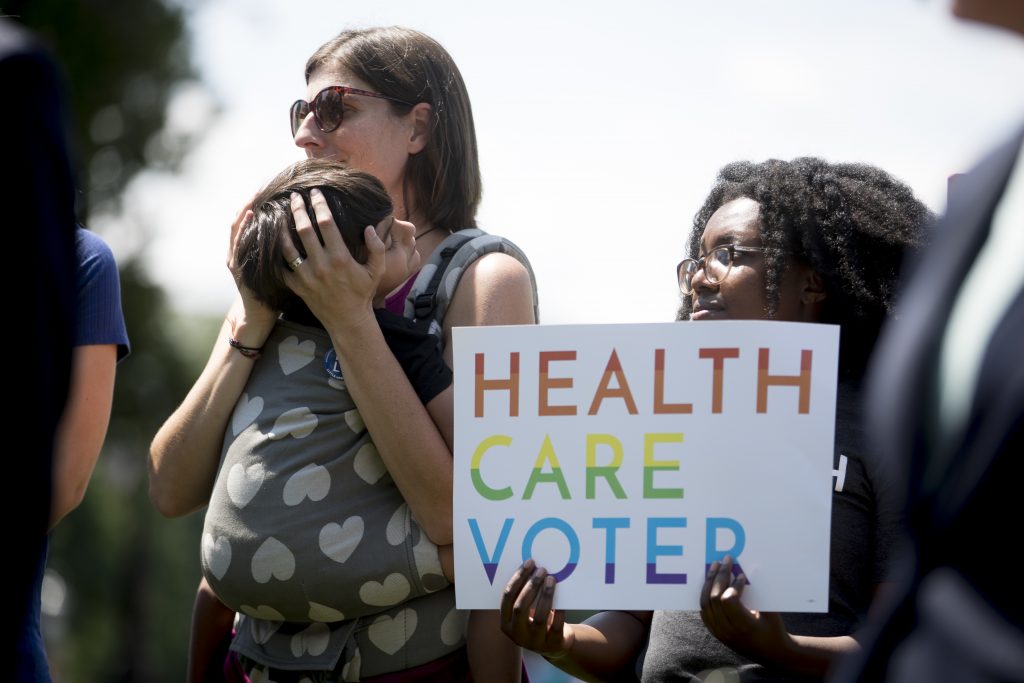 Congress Health Care Families affected by pre-existing conditions attend a news conference on Capitol Hill in Washington, Tuesday, June 26, 2018. (Andrew Harnik/AP Photo)