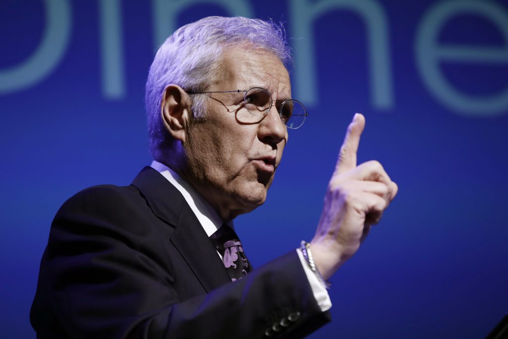 Alex Trebek Moderator Alex Trebek speaks during a gubernatorial debate between Democratic Gov. Tom Wolf and Republican Scott Wagner in Hershey, Pa., Monday, Oct. 1, 2018. The debate is hosted by the Pennsylvania Chamber of Business and Industry. (AP Photo/Matt Rourke)