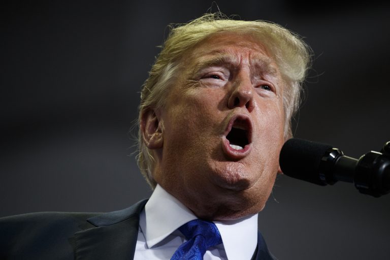 President Donald Trump speaks during a campaign rally at the Landers Center Arena, Tuesday, Oct. 2, 2018, in Southaven, Miss. (AP Photo/Evan Vucci)