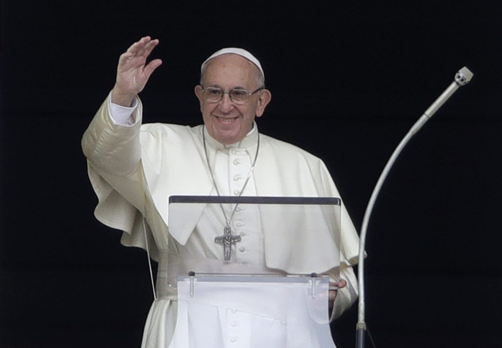 Francis Pope Francis blesses the crowd at the Vatican. (Alessandra Tarantino/AP Photo)