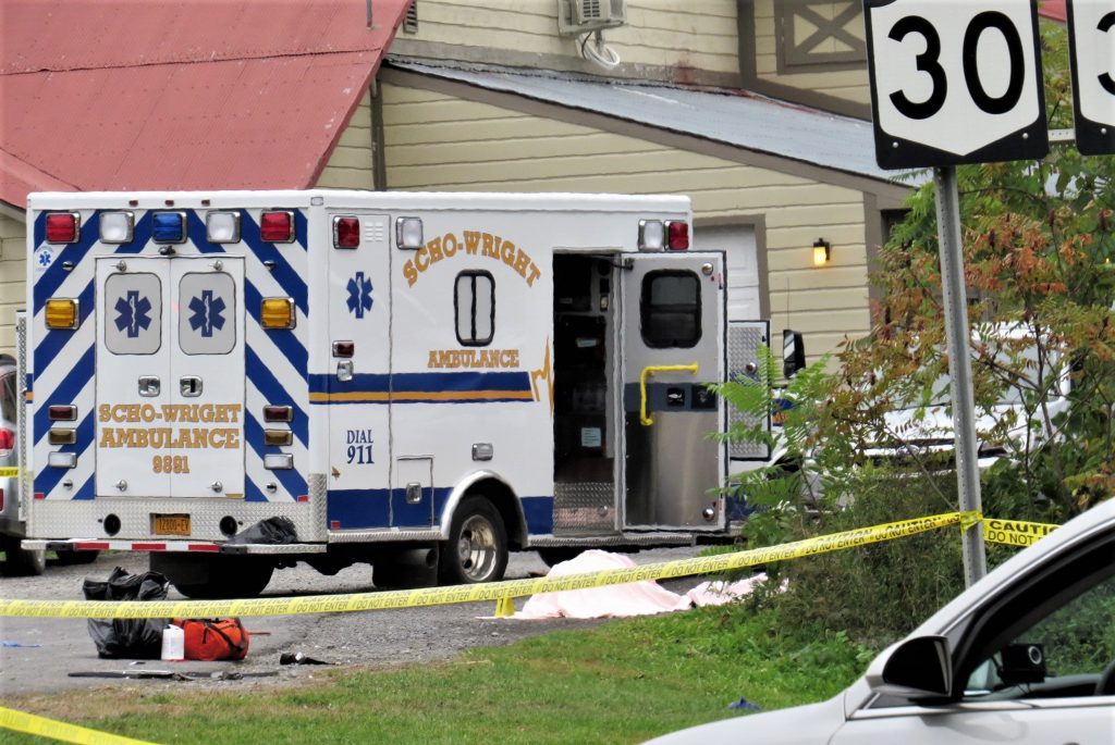 APTOPIX Limousine Crash In this Saturday, Oct. 6, 2018 photo, a body is draped under a blanket at the scene of a fatal crash in Schoharie, N.Y. (Tom Heffernan Sr. via AP)