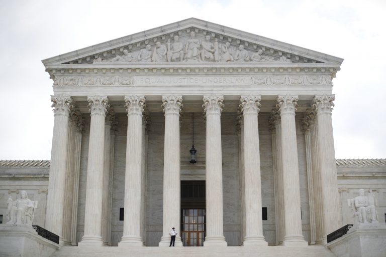Police office guards the main entrance to the Supreme Court in Washington, Tuesday, Oct. 9, 2018 (Pablo Martinez Monsivais/AP Photo)