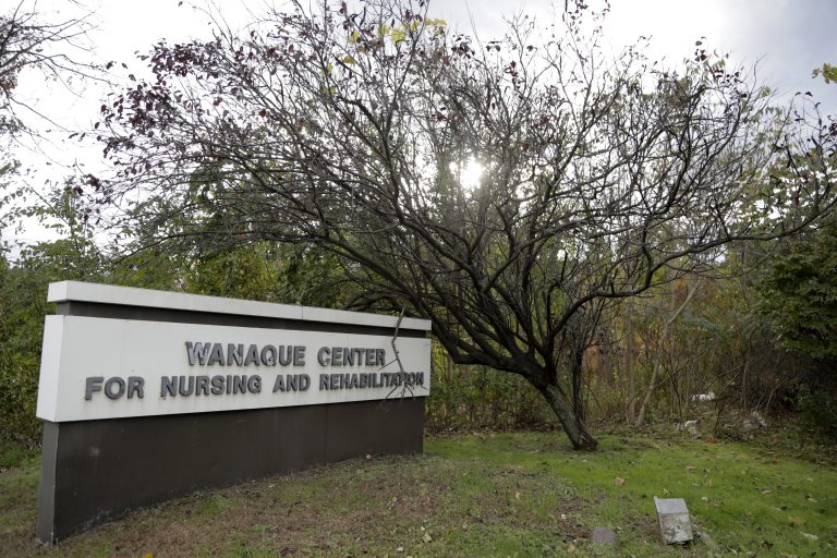A general look of the marquee outside of the Wanaque Center For Nursing And Rehabilitation, where New Jersey state Health Department confirmed the 18 cases of adenovirus, Tuesday, Oct. 23, 2018, in Haskell, N.J.  (AP Photo/Julio Cortez)