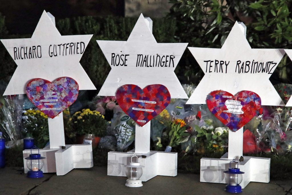 Shooting Synagogue This photo shows some of Stars of David with names of those killed at the Tree of Life Synagogue in Pittsburgh in Saturday's shooting, at a memorial outside the synagogue. (AP Photo/Gene J. Puskar)