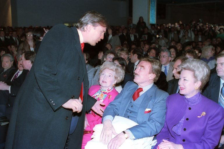 Donald Trump, left, talks with his parents, Mary and Fred and his sister, U.S. District Court Judge Maryanne Trump Barry, at the opening of Trump's Taj Mahal Casino Resort in Atlantic City, N.J., Thurs., April 5, 1990. (AP Photo)