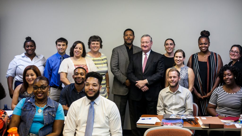 Community_Schools_Meeting-4 Mayor Jim Kenney poses with staff from community schools. (Brad Larrison for WHYY, file)