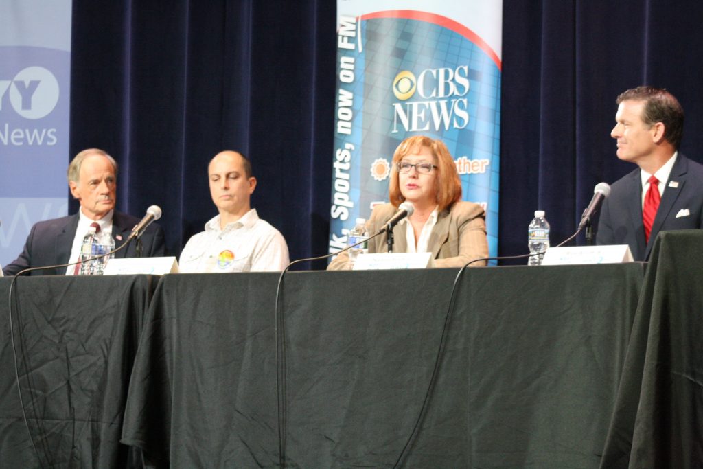 Democrat U.S. Sen. Tom Carper, Green Party candidate Demitri Theodoropoulos, Libertarian Nadine Frost, and Republican Rob Arlett debated Tuesday night at Theatre N in Wilmington. (Mark Eichmann/WHYY)