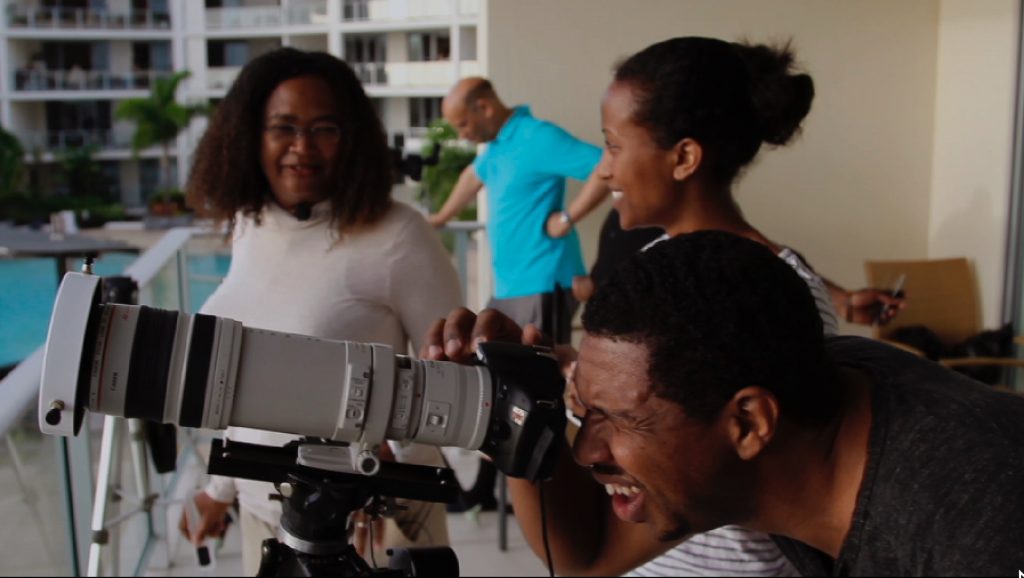 JaritaEclipseday Astrophysicists Jarita Holbrook, Alphonse Sterling (background) Fana Mulu-Moore, and Hakeem Oluseyi (Jarita Holbrook)