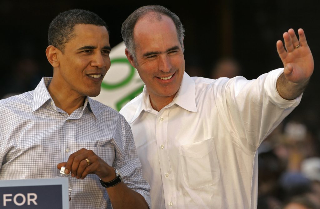 Obama 2008 Democratic presidential hopeful, Sen. Barack Obama, D-Ill., left, looks at the crowd of supporters with Sen. Bob Casey at a rally outside the Lancaster, Pa., train station Saturday, April 19, 2008.