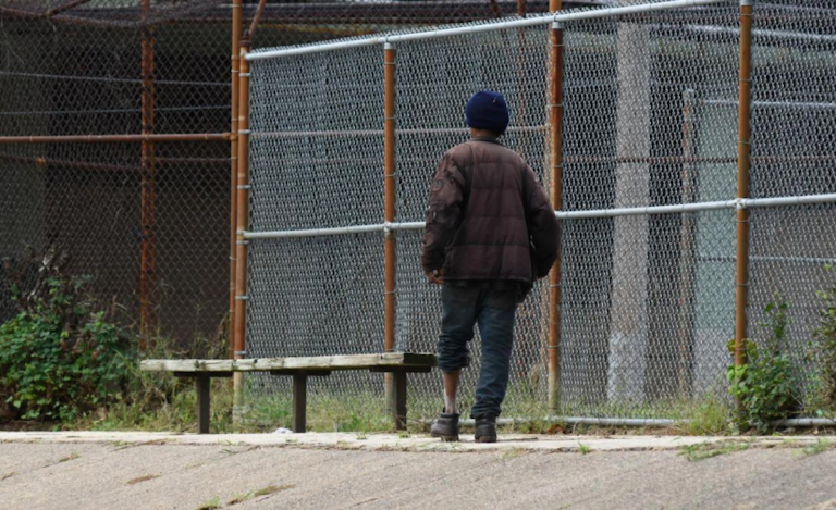 A man walks in North Philadelphia on Friday (Abdul Sulayman/The Philadelphia Tribune)