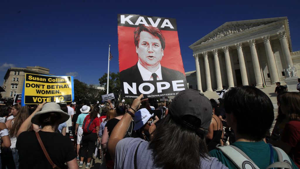 Demonstrators gather Thursday outside the Supreme Court, demanding that the Senate reject Judge Brett Kavanaugh’s nomination.