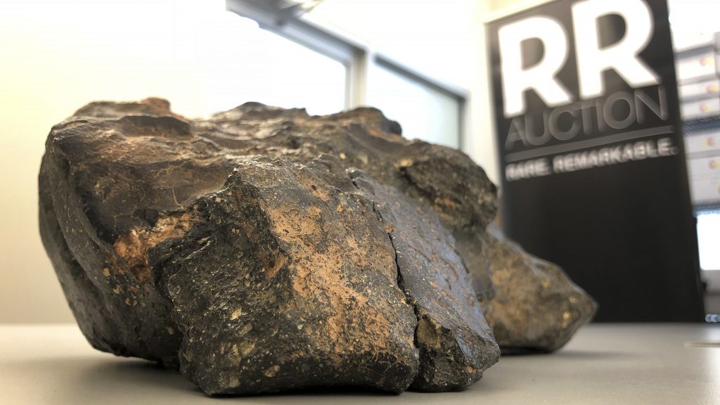 A 12-pound lunar meteorite discovered in Northwest Africa in 2017 rests on a table, in Amherst, N.H. A 12-pound lunar meteorite discovered in Northwest Africa in 2017 rests on a table, in Amherst, N.H. (Rodrique Ngowi/AP)