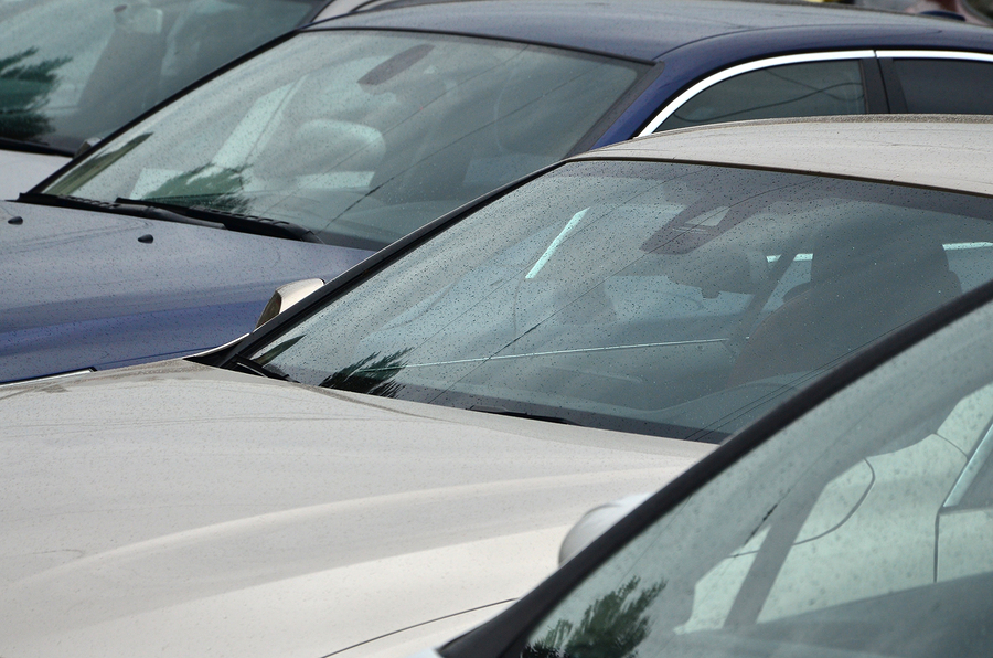 Roofs of several cars. A lot of cars stand close at rush hour (Big Stock)