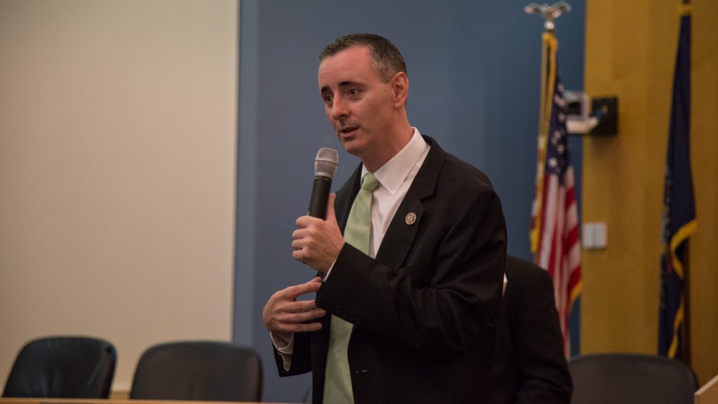 cohen_fitzpatrick-town-hall-10 US Rep. Brian Fitzpatrick of Pennsylvania's 8th district talks to a crowd of constituents during a town hall in Bensalem, PA August 22nd 2017. (Emily Cohen for NewsWorks)