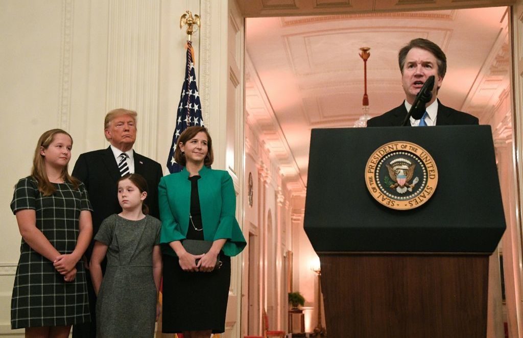 Newly sworn-in Supreme Court Justice Brett Kavanaugh speaks as his wife, daughters and President Trump listen on Monday. “The Supreme Court is an institution of law. It is not a partisan or political institution,” Kavanaugh said. Newly sworn-in Supreme Court Justice Brett Kavanaugh speaks as his wife, daughters and President Trump listen on Monday.